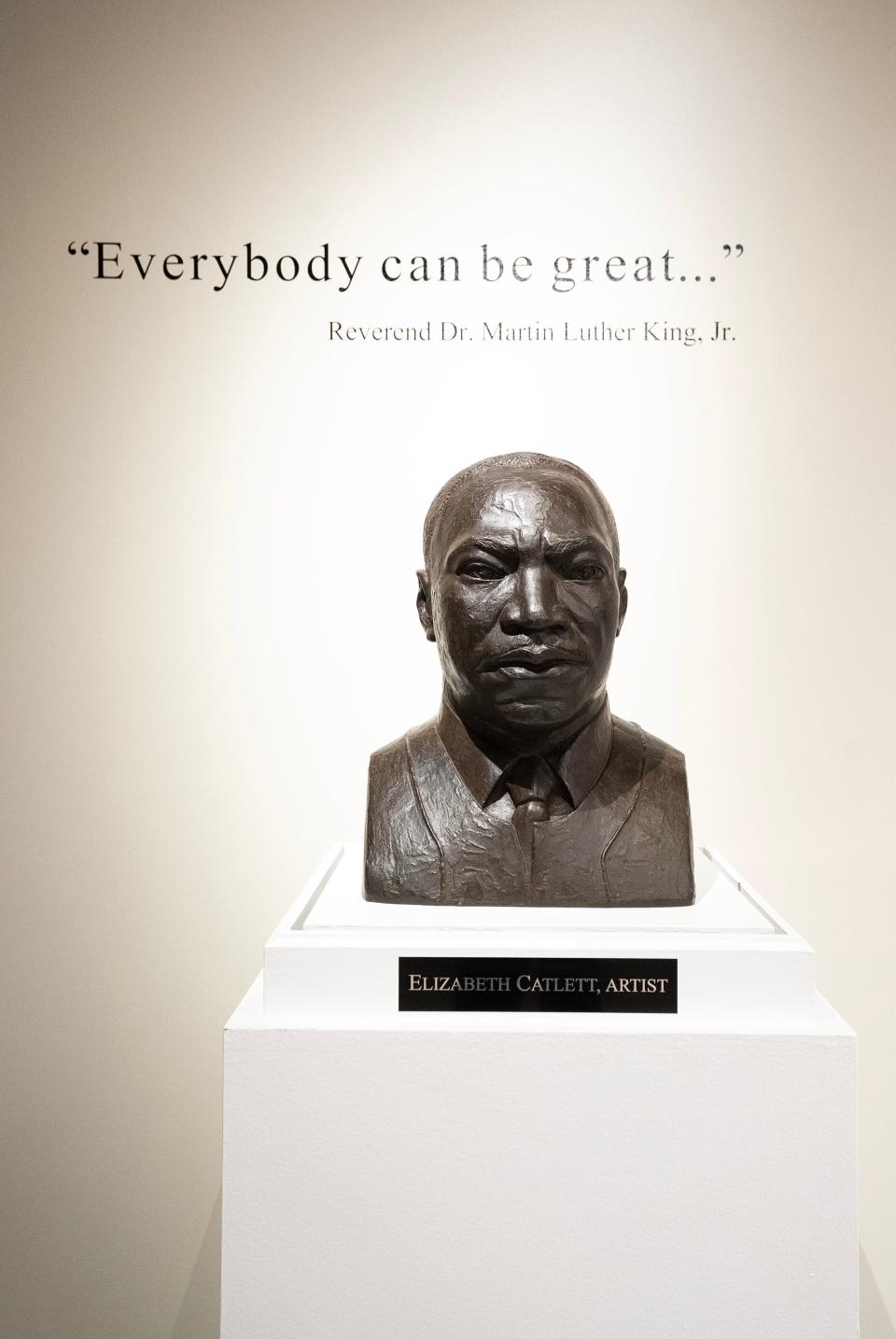 A bronze bust of Martin Luther King Jr. by artist Elizabeth Catlett at the entrance to the King Arts Complex.