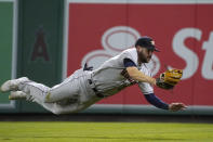 Houston Astros right fielder Chas McCormick makes a catch on a ball hit by Los Angeles Angels' Phil Gosselin during the seventh inning of a baseball game Wednesday, Sept. 22, 2021, in Anaheim, Calif. (AP Photo/Mark J. Terrill)