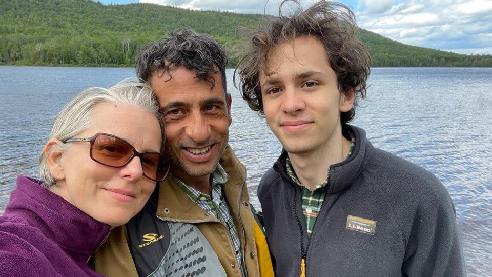 Hisham Awartani, with his mother, Elizabeth Price, and his father, Ali Awartani. - Institute for Middle East