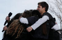 <p>Students and school shooting survivors embrace at the conclusion of the “March for Our Lives” event demanding gun control after recent school shootings at a rally in Washington, U.S., March 24, 2018. (Jonathan Ernst/Reuters) </p>