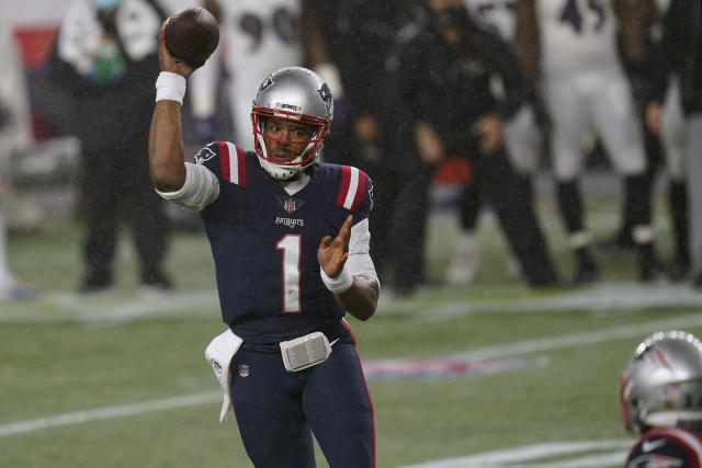 Cam Newton helps Patriots beat Ravens in rain and wind