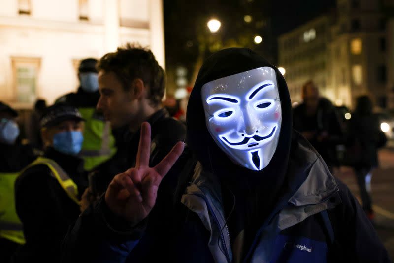 Protestors from the Million Mask March and anti lockdown protesters demonstrate in London