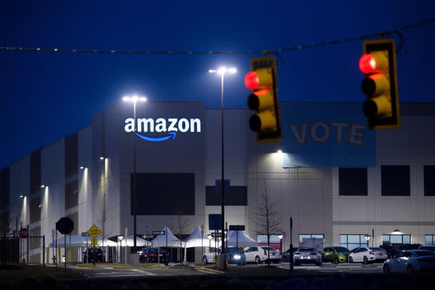 A “Vote” banner hangs at Amazon’s Bessemer, Alabama, warehouse during the union election. Workers ended up voting 1,798 to 738 against unionizing. (Photo: PATRICK T. FALLON via Getty Images)