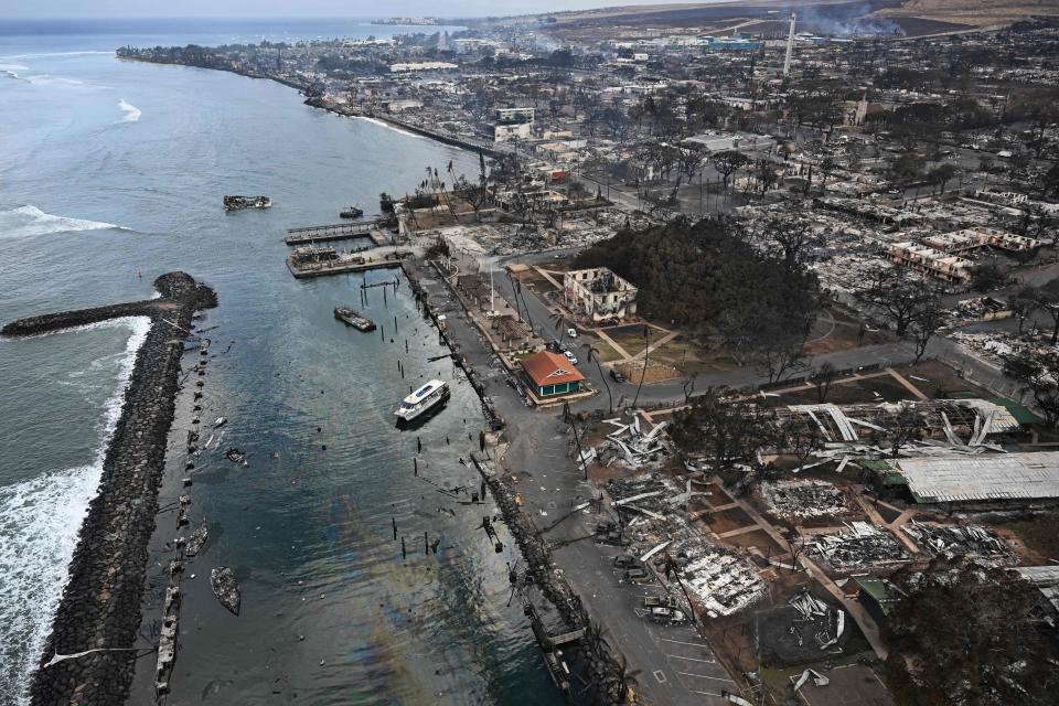 An aerial image taken on August 10, 2023 shows destroyed homes and buildings burned to the ground in the historic Lahaina in the aftermath of wildfires in western Maui in Lahaina, Hawaii. (Patrick T. Fallon / AFP via Getty Images)