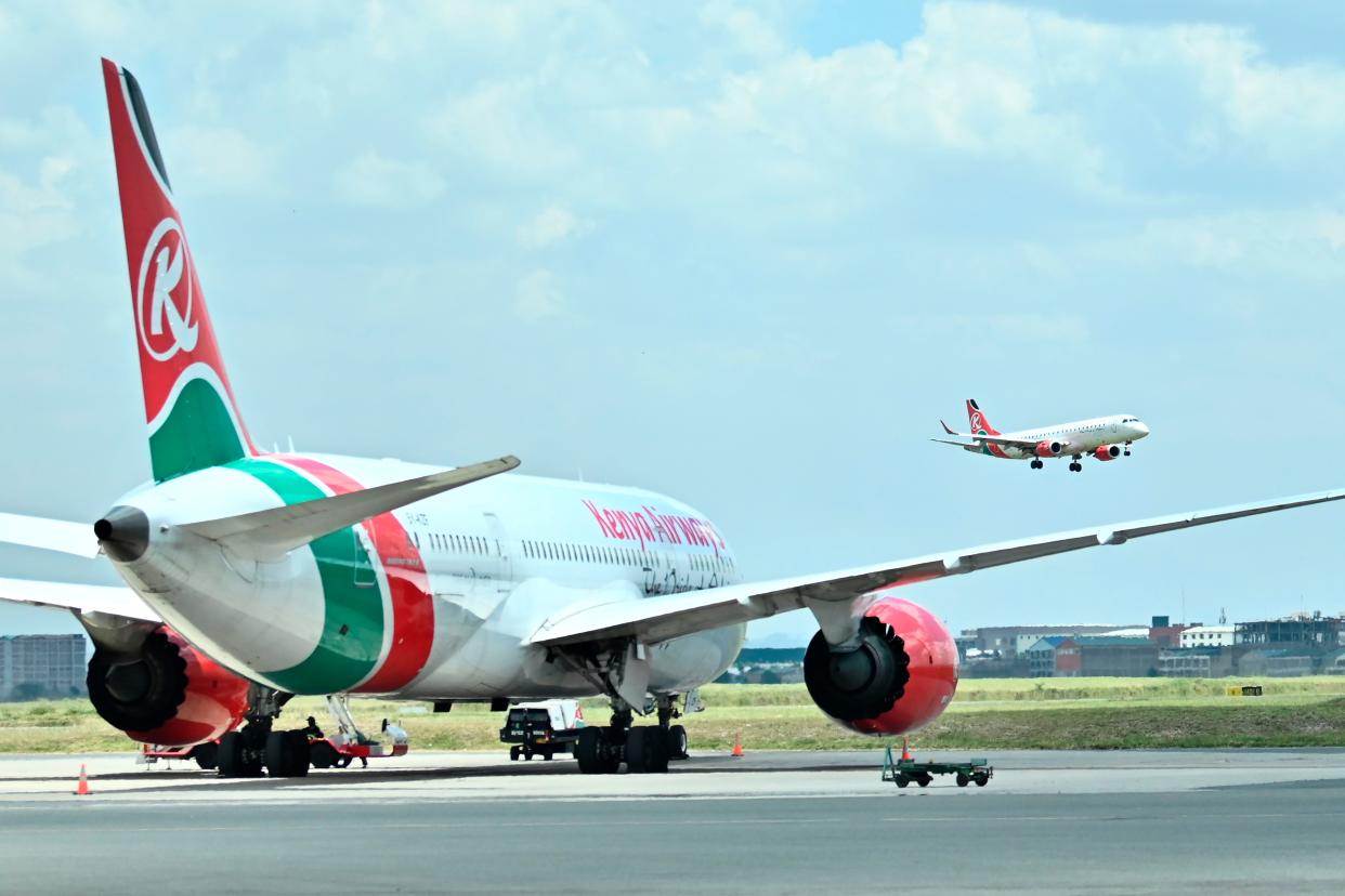 A passenger plane operated by Kenya Airways approaches for landing on March 24, 2020 at the Jomo Kenytta Airport. 