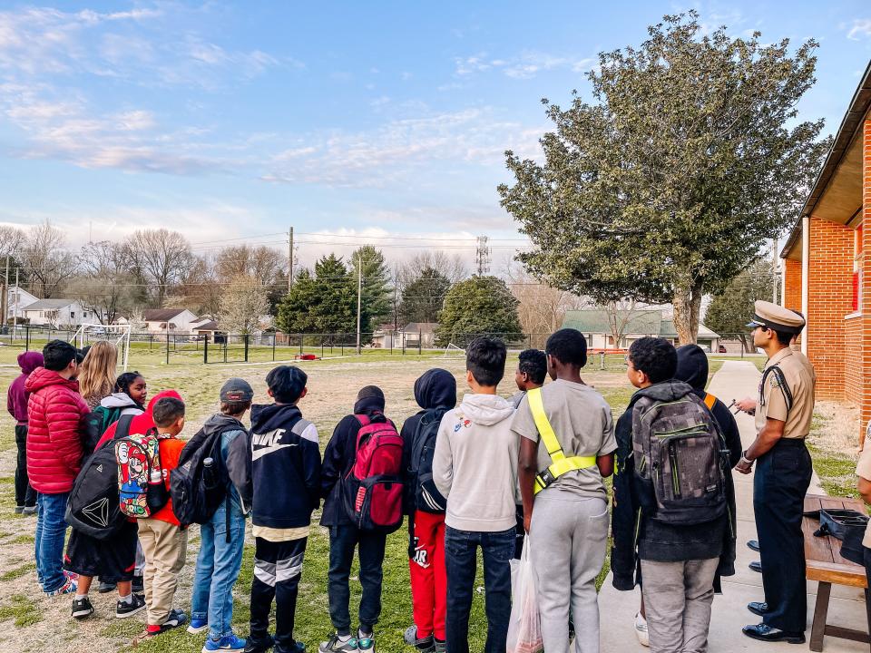Central High School JROTC members demonstrate a drone  during a boy’s leadership group breakfast at Inskip Elementary School on March 30, 2022.