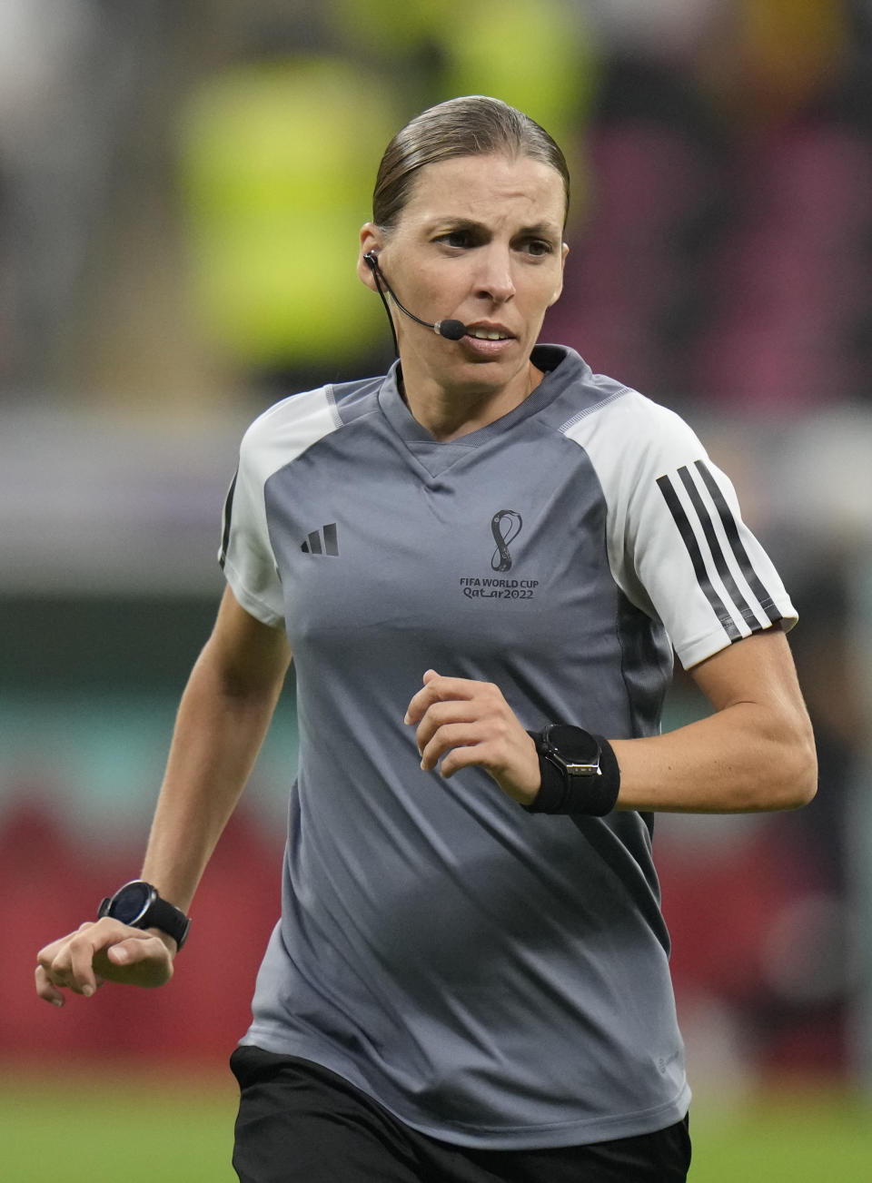 Referee Stephanie Frappart warms up prior to the World Cup group E soccer match between Costa Rica and Germany at the Al Bayt Stadium in Al Khor, Qatar, Thursday, Dec.1, 2022. (AP Photo/Moises Castillo)