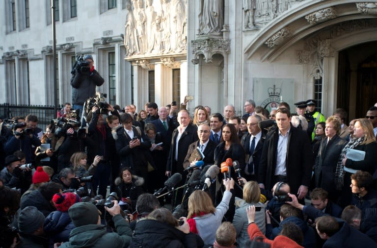 Lead claimant Gina Miller, co-founder of investment fund SCM Private (centre, R), makes a statement outside the Supreme Court, opposite the Houses of Parliament, in central London on January 24, 2017 after the court's ruling on triggering Brexit