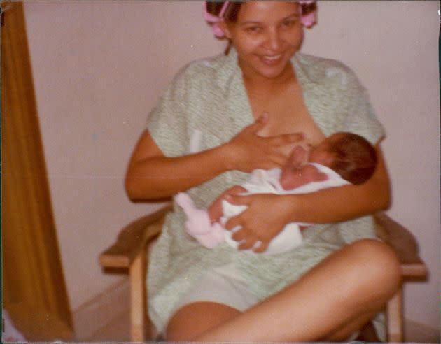 Dr. Yami Cazorla-Lancaster's mother breastfeeding her back in 1979. 