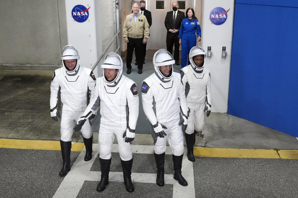 Astronauts, from left, Russian cosmonaut Alexander Grebenkin, pilot Michael Barratt, commander Matthew Dominick, and mission specialist Jeanette Epps pose for a photo as they leave the Operations and Checkout building for a trip to Launch Pad 39-A, Sunday, March 3, 2024, at the Kennedy Space Center in Cape Canaveral, Fla. Four astronauts are scheduled to liftoff on a trip to the International Space Station. (AP Photo/John Raoux)