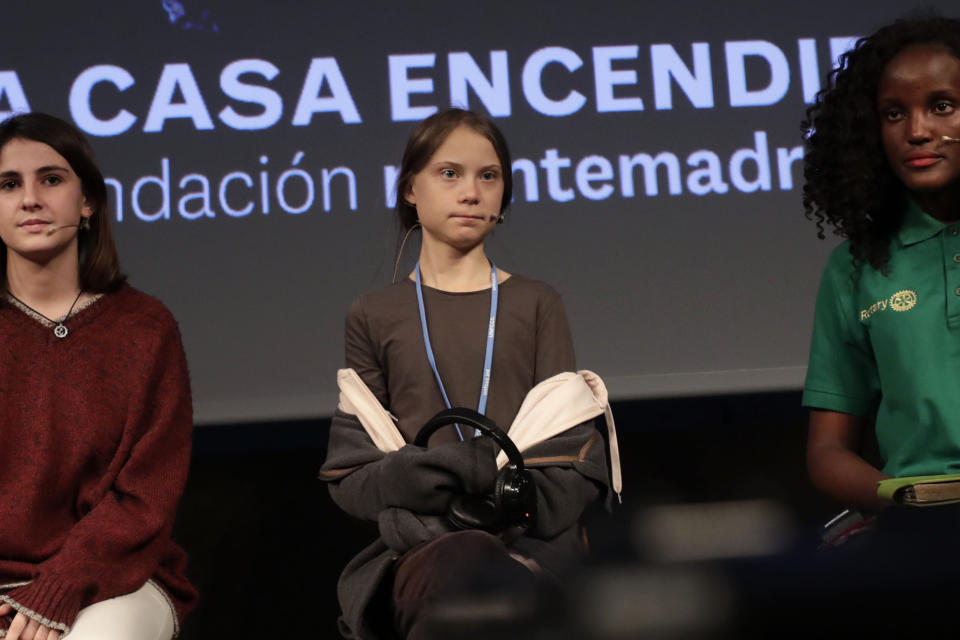 Climate activist Greta Thunberg arrives for a press conference in Madrid, Friday Dec. 6, 2019. Thunberg arrived in Madrid Friday to join thousands of other young people in a march to demand world leaders take real action against climate change. (AP Photo/Bernat Armangue)