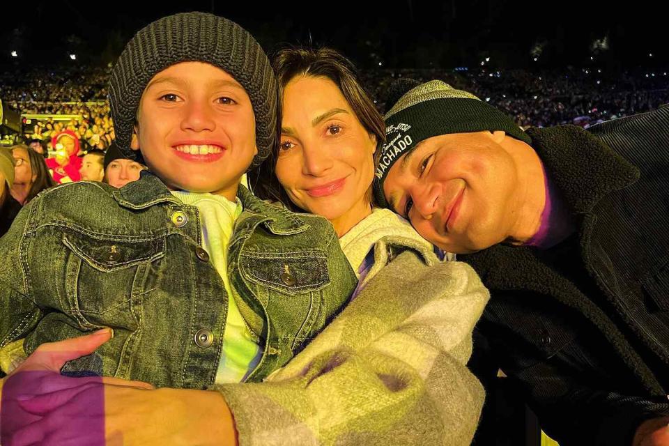 <p>Mario Lopez /Instagram</p> Dominic, Courtney and Mario Lopez at a Mariah Carey concert before Thanksgiving.