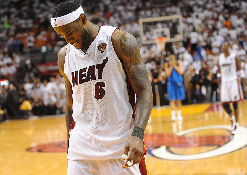 LeBron James of the Heat walks off the court at the end of Game 6 of the NBA Finals at the AmericanAirlines Arena in Miami, Florida, Sunday, June 12, 2011. The Dallas Mavericks defeated the Miami Heat, 105-95. (Robert Duyos/Sun Sentinel/MCT via Getty Images)