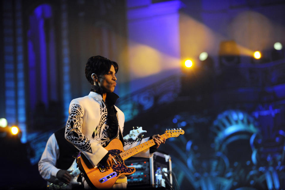 US singer Prince performs on October 11, 2009 at the Grand Palais in Paris. Prince has decided to give two extra concerts at the Grand Palais titled 'All Day/All Night' after he discovered the exhibition hall during Karl Lagerfeld's Chanel fashion show. AFP PHOTO BERTRAND GUAY (Photo credit should read BERTRAND GUAY/AFP/Getty Images)