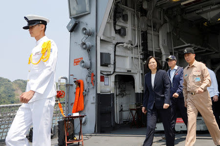 Taiwanese President Tsai Ing-wen walks on board the Kee Lung (DDG-1801) destroyer during a drill near Yilan naval base, Taiwan April 13, 2018. REUTERS/Tyrone Siu