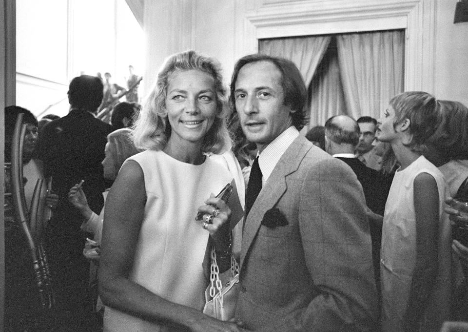 American movie star Lauren Bacall, left, congratulates Marc Bohan, Dior's designer after presentation of the 1969-70 Fall collection at the Paris Christian Dior couture house, on July 31, 1969. French designer Marc Bohan who served as Dior's artistic director for nearly three decades died at age 97, Wednesday, Sept. 6, 2023. (AP Photo/Michel Laurent)