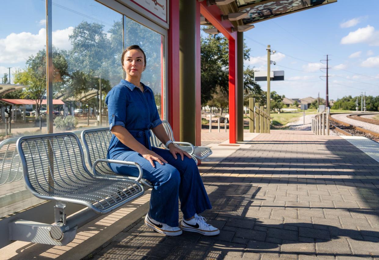 Lulee Guerrero, sitting at the MetroRail Lakeline Station on Nov. 4, used the train and bus to commute to Austin Community College when she was going to school.