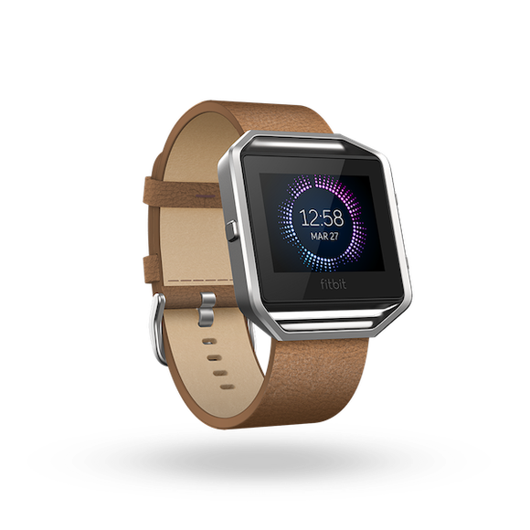 Fitbit Ionic watch with leather band.