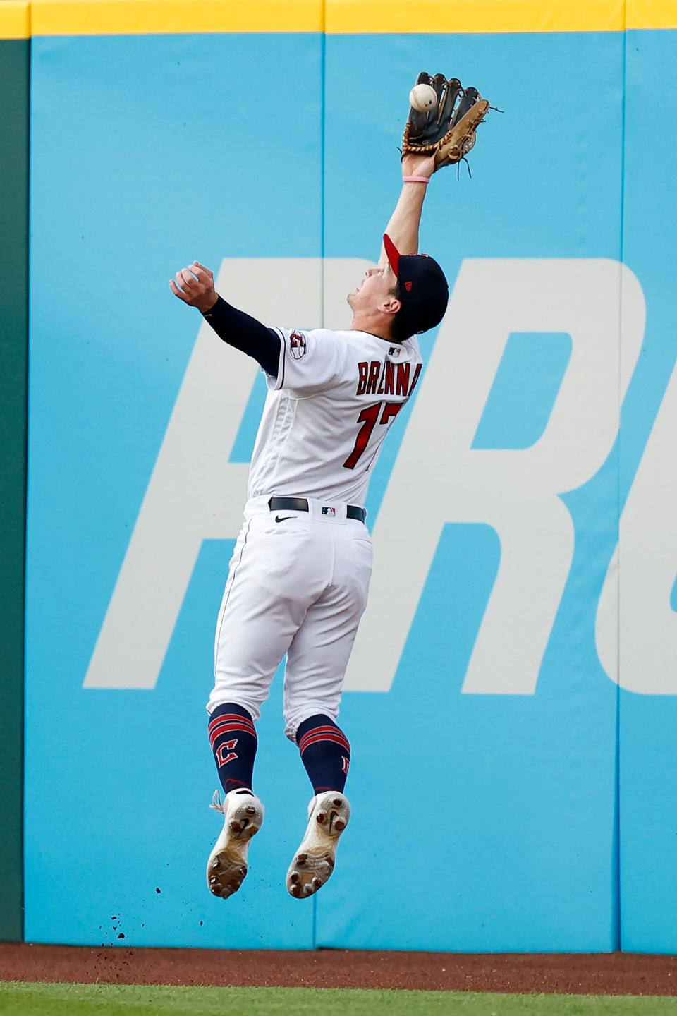 Cleveland Guardians right fielder Will Brennan makes a leaping catch of a ball hit by the Houston Astros' Alex Bregman during the third inning Friday in Cleveland.