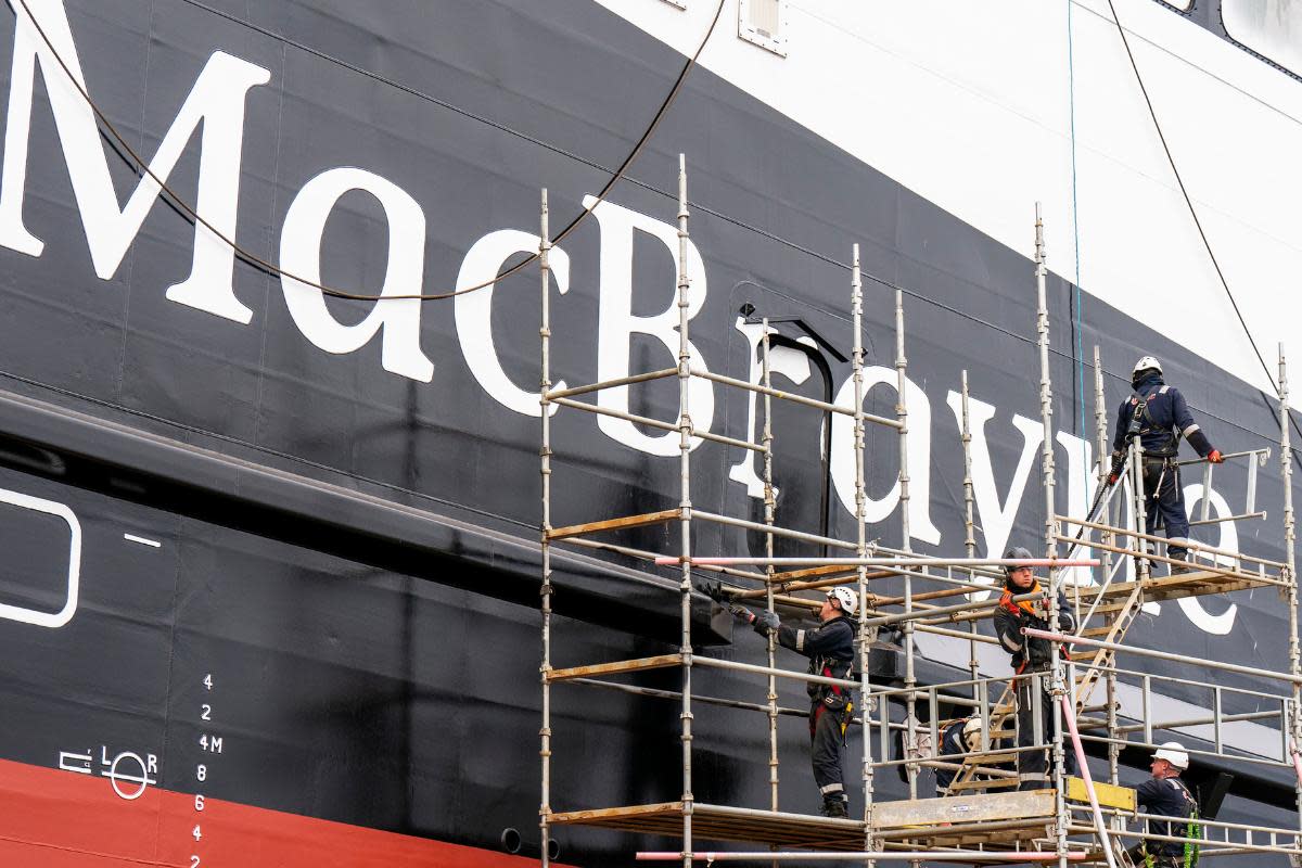 Workers make final preparations before the launch of the MV Glen Rosa at Ferguson Marine Port Glasgow shipyard <i>(Image: PA)</i>