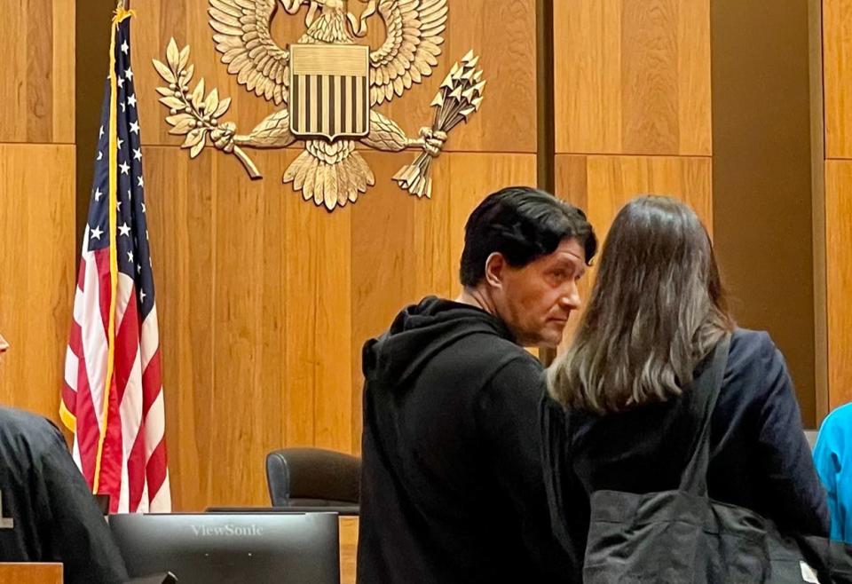 Saint Jovite Youngblood, 51, appears in court in August. A federal magistrate judge has described Youngblood's case as “the most massive pattern of intimidation of threats and violence and death I have ever seen.”