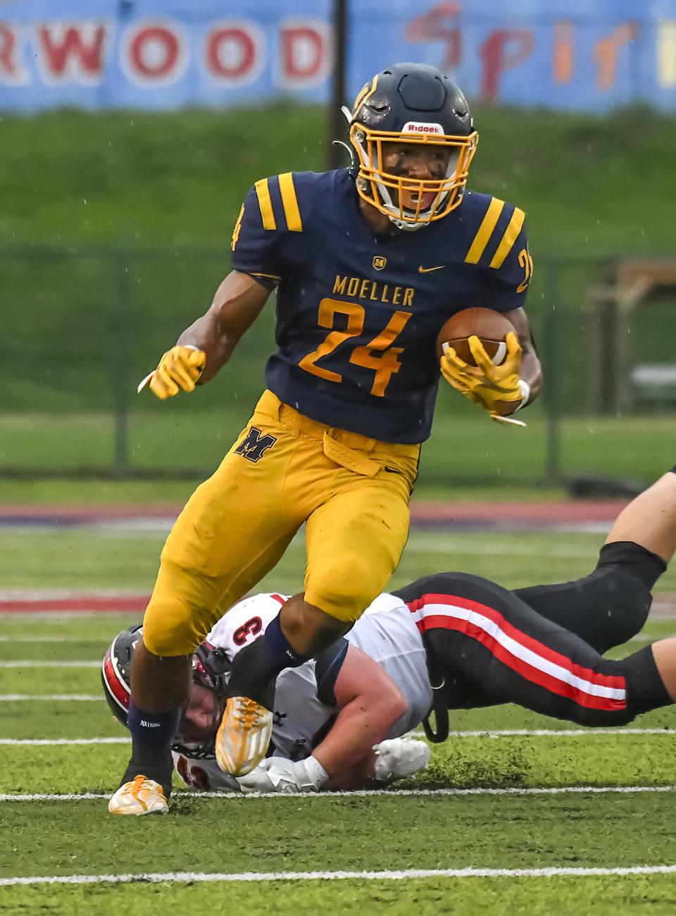 Jordan Marshall of Moeller runs the ball for a touchdown against East Central at Shea Stadium on Saturday, Sept. 3, 2022.