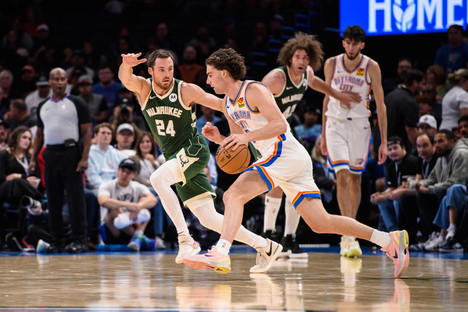 Oct 17, 2023; Oklahoma City, Oklahoma, USA; Oklahoma City Thunder guard Josh Giddey (3) dribbles while defended by Milwaukee Bucks guard <a class="link " href="https://sports.yahoo.com/nba/players/5501" data-i13n="sec:content-canvas;subsec:anchor_text;elm:context_link" data-ylk="slk:Pat Connaughton;sec:content-canvas;subsec:anchor_text;elm:context_link;itc:0">Pat Connaughton</a> (24) during the first half at Paycom Center. Mandatory Credit: Rob Ferguson-USA TODAY Sports