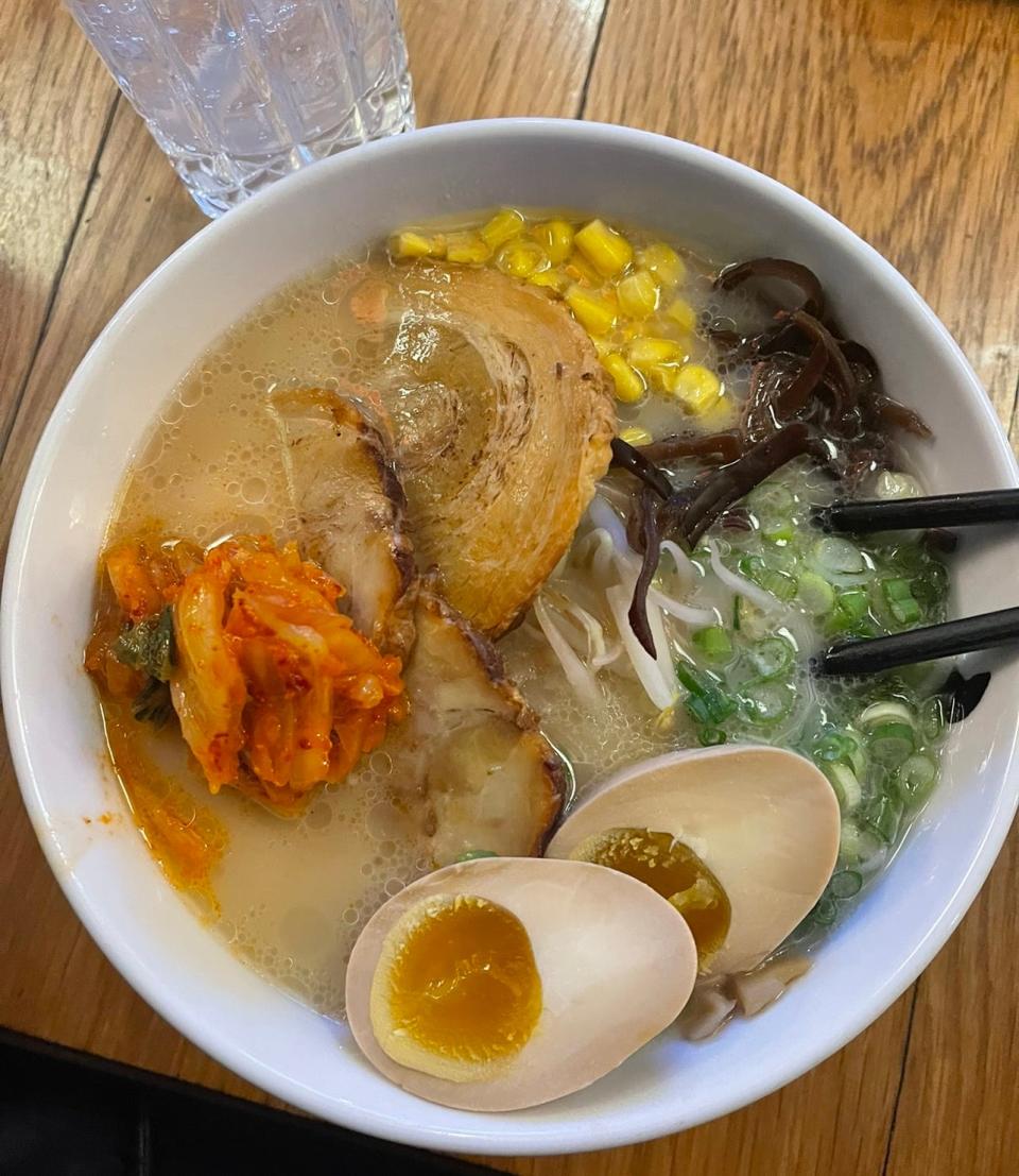 Miso ramen with pork slices, scallions, bean sprouts, corn, bamboo shoots and a half boiled egg from Hide-Chan Ramen in New York City.