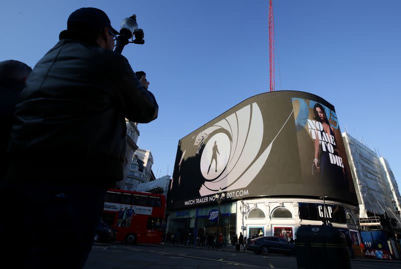 Trailer for a James Bond film "No Time to Die" is displayed in London