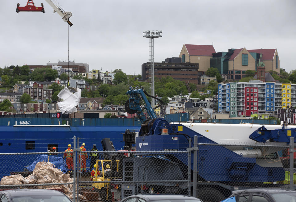 Debris from the Titan submersible, recovered from the ocean floor near the wreck of the Titanic, is unloaded from the ship Horizon Arctic at the Canadian Coast Guard pier in St. John's, Newfoundland on Wednesday, June 28, 2023. (Paul Daly/The Canadian Press via AP)