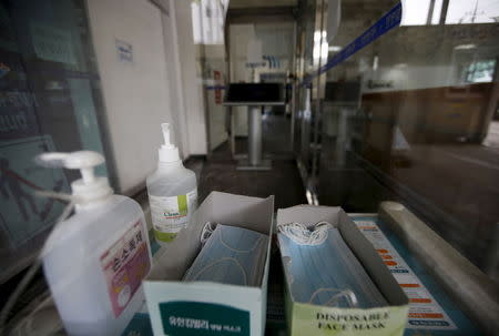 Hand sanitizers and masks to avoid infection with Middle East Respiratory Syndrome (MERS) are seen inside a hospital which is sealed off temporarily, in Seoul, South Korea, June 16, 2015. REUTERS/Kim Hong-Ji