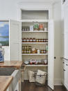 <p>This home may be only one story, but the designers have managed to fit in plenty of storage space. The evidence: just check out this pantry in the kitchen. </p> <p><strong>RELATED: <a href="https://www.realsimple.com/home-organizing/organizing/organizing-kitchen/pantry-organization-ideas" rel="nofollow noopener" target="_blank" data-ylk="slk:Genius Pantry Organization Ideas;elm:context_link;itc:0;sec:content-canvas" class="link ">Genius Pantry Organization Ideas</a></strong></p>