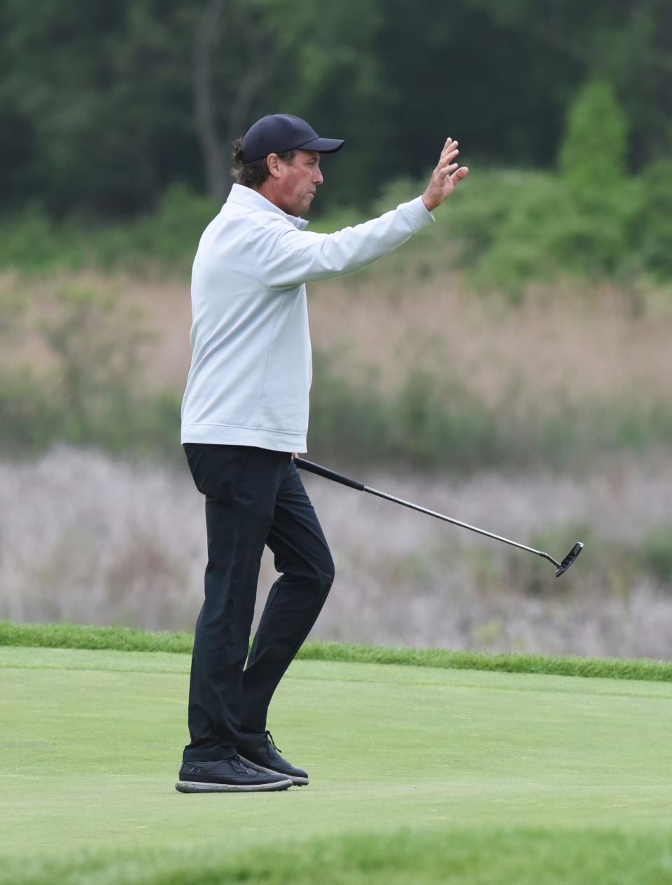 Stephen Ames acknowledges the gallery on the 16th hole during the second round of the Senior PGA Championship golf tournament Friday, May 27, 2022, at Harbor Shores in Benton Harbor, Mich. (Don Campbell/The Herald-Palladium via AP)