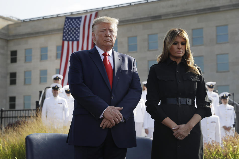 President Donald Trump and first lady Melania Trump participate in a moment of silence honoring the victims of the Sept. 11 terrorist attacks, Wednesday, Sept. 11, 2019, at the Pentagon. (AP Photo/Evan Vucci)