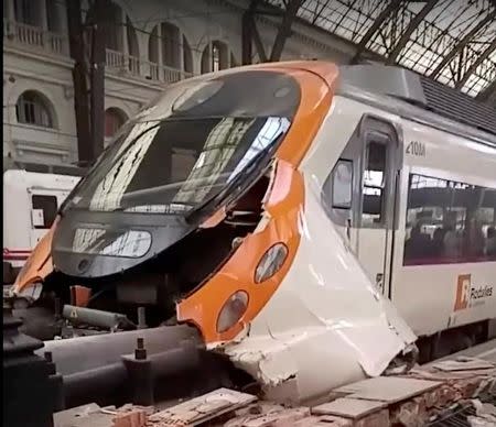 A commuter train is seen crashed into a railway buffer in Barcelona's Francia station, Spain July 28, 2017 in this still image from a video obtained from social media. Courtesy of Felix Rios /via REUTERS