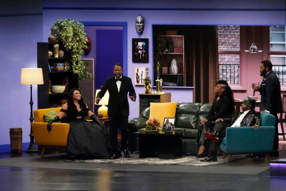 Tisha Campbell, Martin Lawrence, Tichina Arnold, Carl Anthony Payne II, and Anthony Anderson present the award for outstanding lead actor in a comedy series on a "Martin" set during the 75th Emmy Awards at the Peacock Theater in Los Angeles on Monday, Jan. 15, 2024.