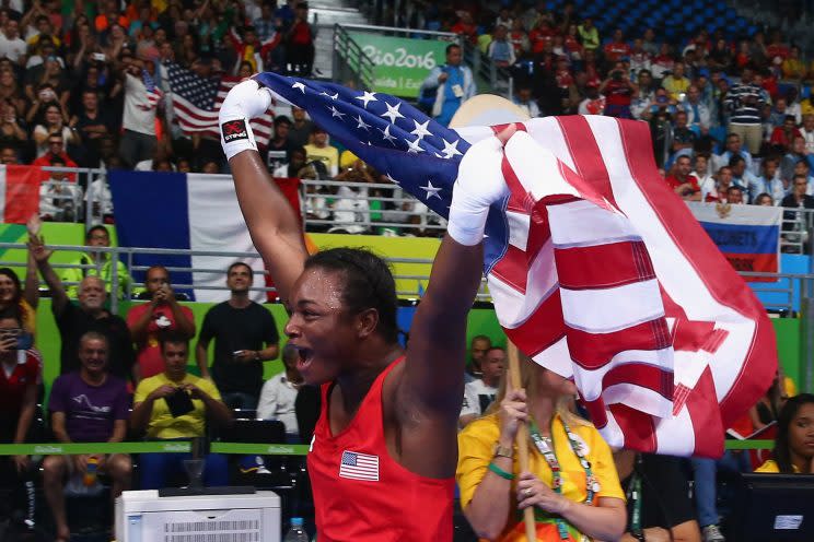 Claressa Shields celebrates after winning her second Olympic gold medal. (Getty)