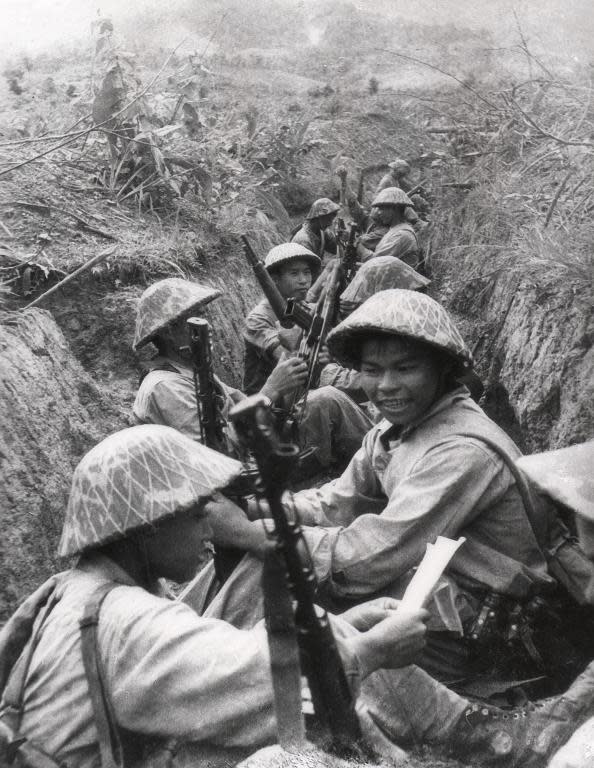 Vietnamese soldiers rest in a trench during the battle of Dien Bien Phu in 1954