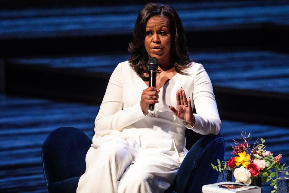 Michelle Obama speaks Chimamanda Ngozi Adichie at The Royal Festival Hall on December 3, 2018, in London, England.