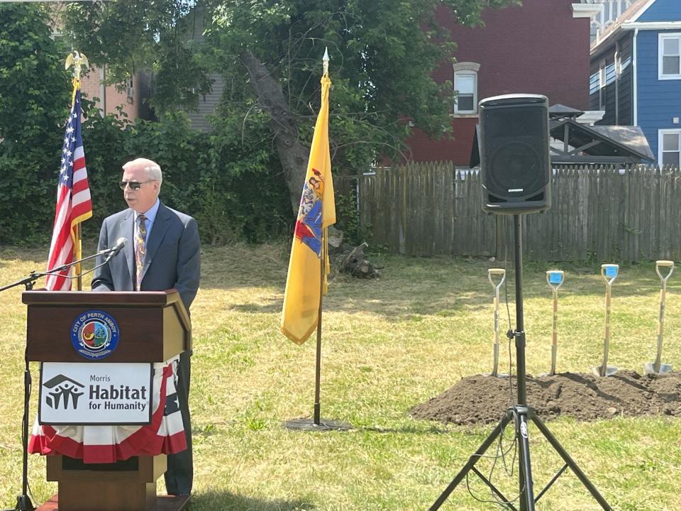 Douglas Dzema, Executive Director of the Housing Authority of the City of Perth Amboy, speaks at the Morris Habitat for Humanity groundbreaking.