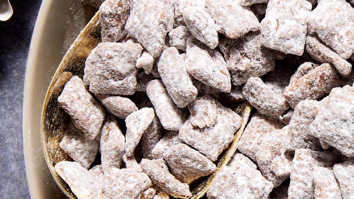 chex mix tossed in peanut butter and powdered sugar