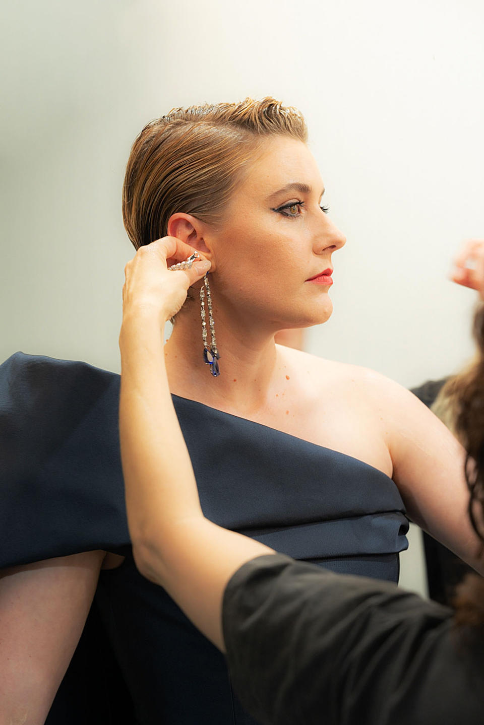 Gerwig getting ready in the green room of the Palais des Festivals.