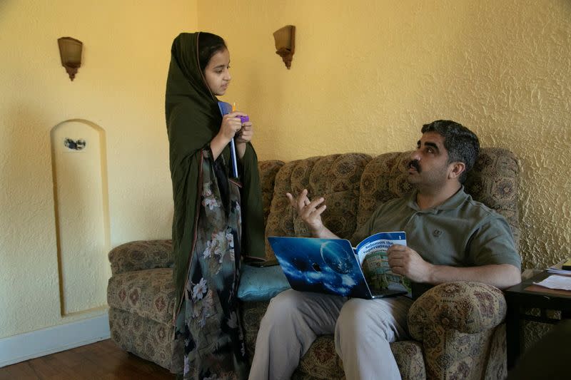 The Wider Image: From Kabul to Kentucky: Afghans put down roots in refugee haven