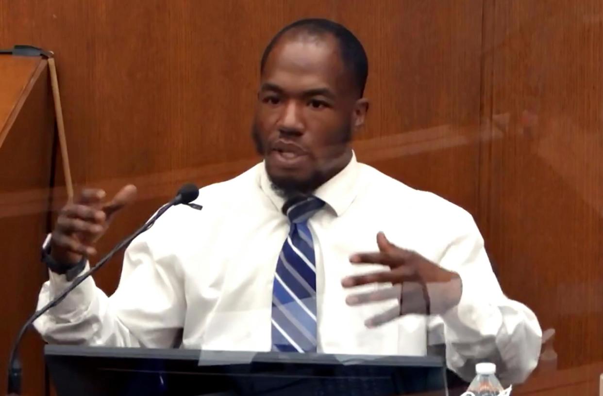 <span>Donald Williams answers questions during the trial of former Minneapolis police officer Derek Chauvin on 29 March 2021.</span><span>Photograph: Court TV via AP</span>
