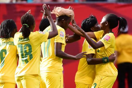 Cameroon forward Gaelle Enganamouit (17) celebrates with teammates after scoring a goal for a hat trick against Ecuador in a Group C soccer match in the 2015 women's World Cup at BC Place Stadium. Mandatory Credit: Anne-Marie Sorvin-USA TODAY Sports