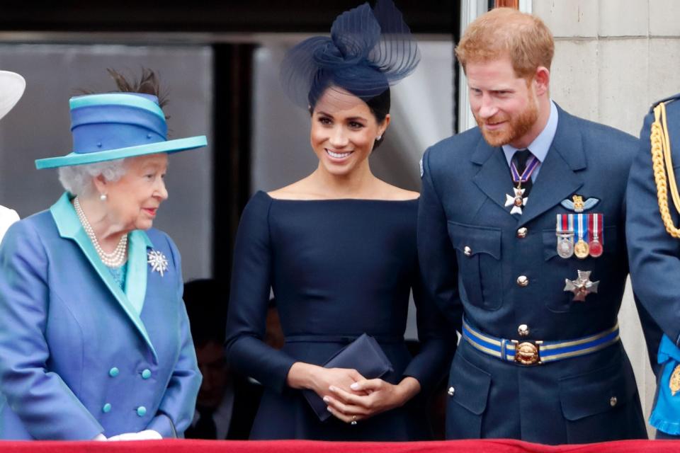 Queen Elizabeth II, Meghan, Duchess of Sussex and Prince Harry, Duke of Sussex