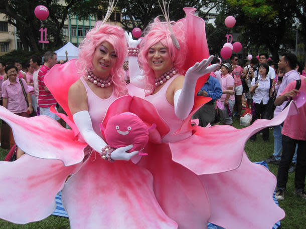 Ivan Heng and Glen Goei, donned in pink floral glory. (Yahoo! photo/Jeanette Tan)