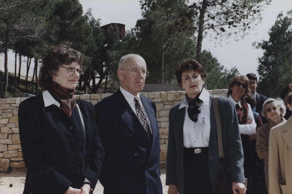 Andrzej Sitkowski, center, attends with Marion Kozak Miliband, left, and Hadassah Kozak, right, a ceremony in Yad Vashem, Jerusalem, Feb. 19, 1996. Andrzej Sitkowski was 15 years old when his mother told him that she had been asked by a neighbour to hide the little Jewish girl Hadassah Kosak from the Nazis at their home. This year, as the world commemorates the 77th anniversary of the liberation of the German Nazi Auschwitz concentration and extermination camp on January 27, 1945, Yad Vashem and the Conference on Jewish Material Claims against Germany have teamed up to highlight the stories of "Righteous Rescuers" the people who risked everything, even their own lives, to save Jews from getting murdered by the Nazis and their henchmen.( Yad Vashem via AP)