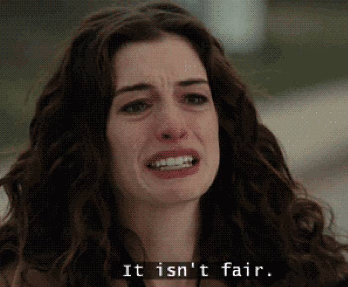 Anne Hathaway in "Love And Other Drugs" crying with caption "It isn't fair."