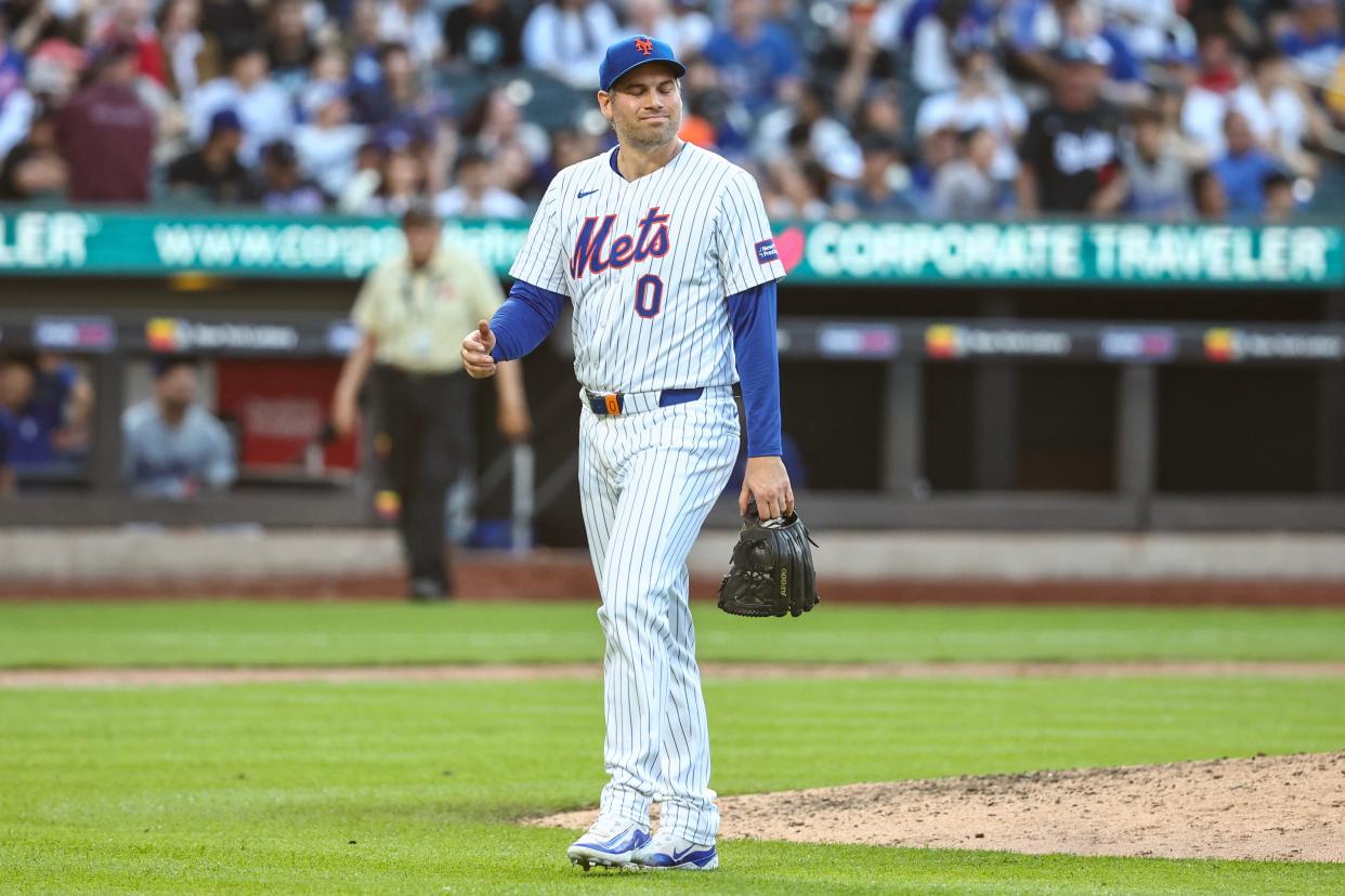 New York Mets relief pitcher Adam Ottavino (0) walks off the field after being taken out of the game in the eighth inning against the Los Angeles Dodgers on May 29, 2024, at Citi Field.